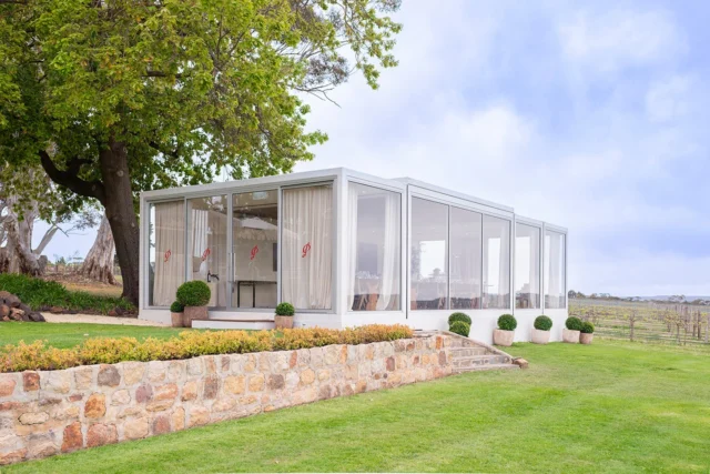 We are excited to share this breathtaking, custom-designed venue built by SPACECUBE, nestled at Penfolds, Kalimna Vineyard in the picturesque Barossa Valley. Tucked beneath an acorn tree and in the shadow of the Historic Homestead, five modular cubes have been seamlessly connected, some side by side and others end to side, creating a spacious dining area with awe-inspiring views of the vineyard. 

Keeping things simple, this innovative modular structure was swiftly delivered and installed with minimal impact on the stunning surrounding landscape and will be onsite long-term. SPACECUBE's Build System is designed to be reconfigured and reused, offering endless possibilities for future uses down the track, wether it be on the same site or relocated to a new one. 

Scalable + Sustainable + Simpler 
#Penfolds #180years #ModularBuilding #NotOrdinary