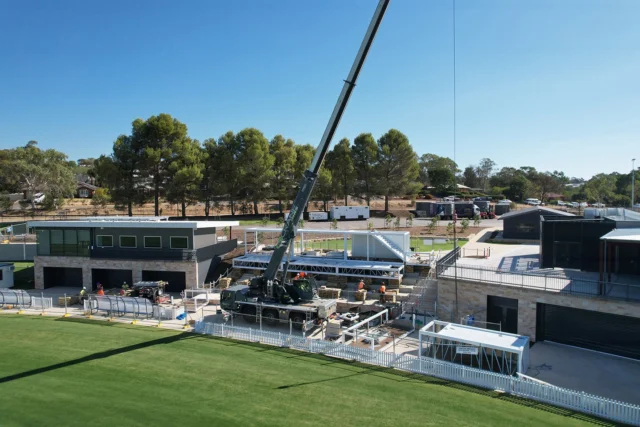 A closer look at the installation of SPACECUBE's multi-level modular structure at the AFL Gather Round in Barrossa earlier this year. We were thrilled to support IEDM in building this pavilion for coaches, media, and officials - set on the seating over-looking the oval. 

Our custom-engineered columns meant seamless integration into the seating and no extra scaffold decking was required. Early planning, smooth collaboration and a focus on safety set this project up for success, which was live for two games during the event.

Scalable. Sustainable. Simpler.
http://www.spacecube.com
#AFL #Footy #GatherRound #ModularStructures